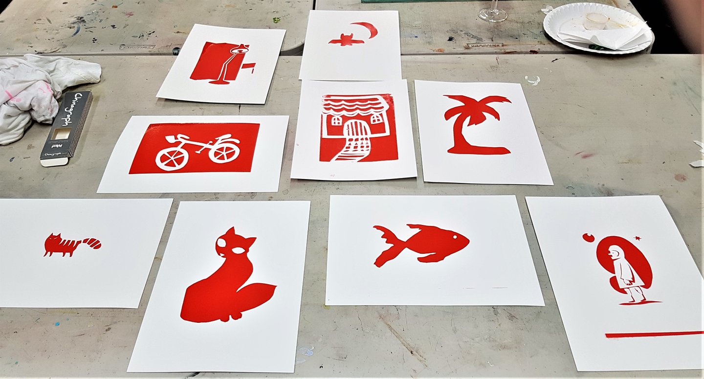 Screen printing Demo first round of red ink all artwork for blog 1